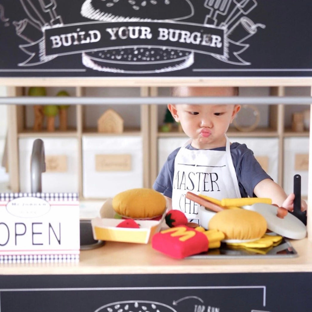 Kinderen maken hun favoriete burgers met deze kleurrijke "Build Your Burger Bar" stickers. Een smakelijke aanvulling op elke kinderkeuken!